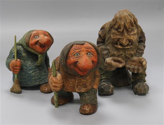 Three carved wooden trolls tallest 19cm